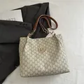 Chic tote bag featuring cream monogram M pattern with leather chain strap for women - Khaki
