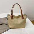 Woven straw bucket tote bag with brown faux leather long handles for summer beach - Brown