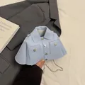 Unique shirt-shaped crossbody bag in light blue faux leather with silver chain strap - Blue