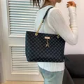 Large black tote bag with geometric pattern and golden deer charm for women commute - Black