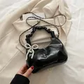 Chic black pleated shoulder bag with pearl bow charm and elegant chain strap - With Pendant / Black