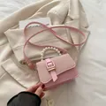 Pink PU leather and woven crossbody bag with pearl handle and long strap for summer - Pink