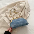 Retro denim-style blue clutch with gold metal frame and delicate chain strap - Sky Blue Distressed Texture (88256) / Sky Blue