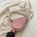 Chic pink teardrop evening bag with sparkling rhinestone edges and metal handle - Pink