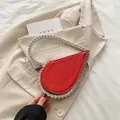 Fashionable red leather heart-shaped evening handbag with sparkling crystal rhinestones - Red
