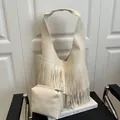 Creamy white hobo shoulder bag with bohemian fringe details and inner pouch - White