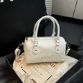 White snakeskin textured Boston handbag with gold hardware and top handles - White (Without Charm)