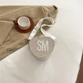 White heart-shaped straw crossbody bag with SM embroidery and adjustable wide strap - White