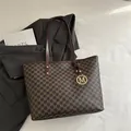 Classic dark brown tote bag with all-over M pattern and golden metal pendant - Brown