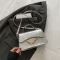 Silver crocodile pattern box bag with gold chain strap and metallic finish - Silver