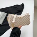 Beige monogram small square bag with golden chain and letter M logo design - White