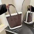Brown faux suede bucket bag with white faux fur trim and dual handles for autumn winter - No Pendant / Coffee