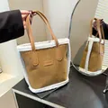 Brown suede bucket bag with white faux fur trim and faux leather handles - No Pendant / Brown