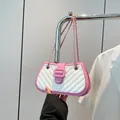 Pink and white patchwork shoulder bag with V-shaped quilting and gold chain strap - Pink