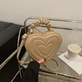 Chic heart-shaped beige crossbody bag with quilted texture and ruched top handle - Khaki