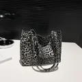 Minimalist black and white leopard print canvas tote bag with slim shoulder straps - Black
