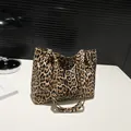 Classic leopard print tote bag in brown and black with long shoulder straps for daily use - Brown