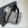Canvas tote bag with black and white leopard print and wide fabric shoulder straps - Off White