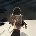 Brown leopard print crossbody bag with gold hardware and knotted shoulder strap - Yellow