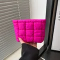 Quilted puffer pouch bag in rose red finish with a minimalist checkered pattern design - Rose Pink