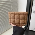 Brown quilted puffer handbag featuring minimalist square stitching and soft silky texture - Khaki