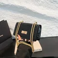 Chique zwarte lakschoudertas met krokodillenpatroon en gouden schakelketting - Zwart