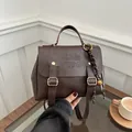 Vintage dark brown faux leather backpack with litchi texture and gold metal hardware - With Pendant / Coffee