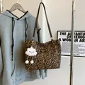 Leopard print tote bag with brown straps and a white cloud plush charm on a metal hanger - With Cloud Pendant / Brown