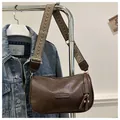 Detail of brown PU leather crossbody bag with jacquard strap and fashion logo - Brown