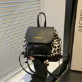 Vintage leopard print and black leather backpack with a drawstring closure for women - Black