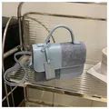 Light blue and grey patchwork square handbag with shoulder strap and fashion tag - Blue