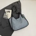 Sac fourre-tout minimaliste en feutre bleu-gris avec bordure en cuir noir et sangle - Bleu