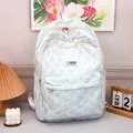 Light blue and white geometric textured backpack with vintage fashion label and large capacity - Blue