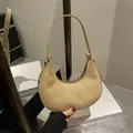 Minimalist khaki suede hobo bag with crescent shape and adjustable shoulder strap - Khaki