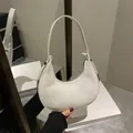 Minimalist white textured hobo bag with silver buckle detail and matching shoulder strap - White