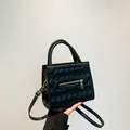 Minimalist black square crossbody bag for women with embossed lattice and gold hardware - Black