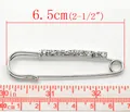 Detailed size view showing 6.5cm silver rhinestone safety pin brooch with measuring tape - 10 Pieces/Pack (6.5cm x 1.8cm) / Silver