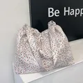 Borsa tote in tela a fiori con piccoli fiori rossi e tracolla regolabile per donna - Rosso