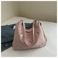 Pink pleated hobo bag with silver butterfly buckles and metallic chain strap detail - Pink