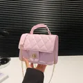 Chic pink quilted PU leather square handbag with golden chain strap and twist lock - Pink