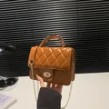 Brown quilted crossbody bag with golden turn-lock and chain strap in PU leather - Brown