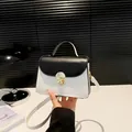 Minimalist black and white color-block small square bag with golden lock and strap - Black
