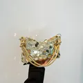 Goldene Pailletten-Handtasche mit geknoteten Griffen und metallischem Schimmer - Gold