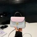 Pink and white color-block small square bag with gold metal clasp and top handle - Pink