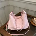 Light pink pleated crossbody bag with silver chain and adjustable shoulder strap - Pink Without Pendant