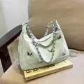 Borsa tote verde chiaro con trama marmorea e farfalle argentate su tracolla in pelle - Senza Ciondolo / Verde