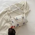 White cylinder pillow bag with blue bear jacquard pattern and elegant pearl handle - Little Bear White