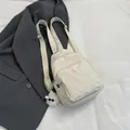 Versatile cream pleated chest bag for women with adjustable strap and plush toy charm - With Pendant / White