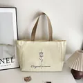 Sac fourre-tout minimaliste en toile beige avec imprimé fleuri et anses brunes - Style Imprimé Rose (Elegant woman) / Blanc Cassé