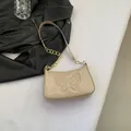 Beige patent leather shoulder bag with embossed butterfly pattern and gold chain strap - Khaki
